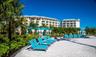 Resort pool with lounge seating in Margaritaville Resort Orlando Central Florida