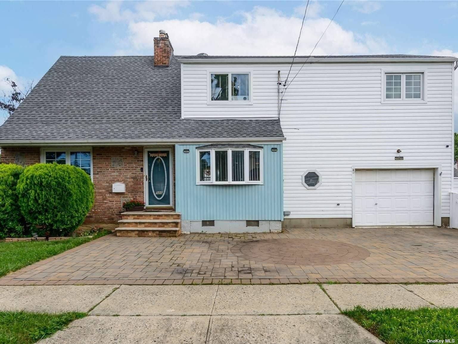 Beautiful 4 bedroom, 3 full bath Colonial located in the heart of New Hyde Park and updated throughout featuring spacious sunlit principal rooms and brand new mahogany hardwood flooring throughout.