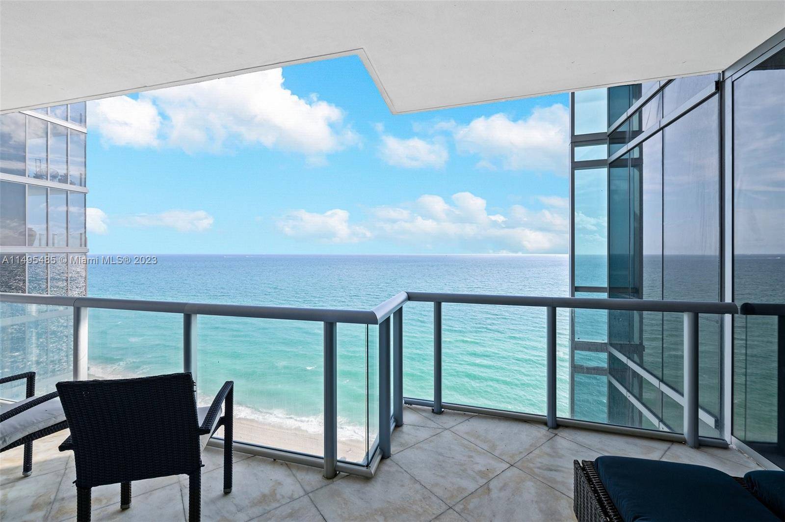 Discover coastal luxury at its zenith in Jade Ocean in this corner residence with floor to ceiling windows on three sides, offering breathtaking direct ocean and city views.