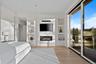 Bedroom with access to exterior and light hardwood / wood-style flooring