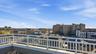 Balcony featuring a view of city