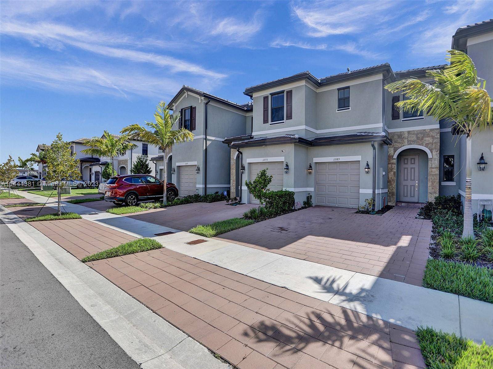 Beautiful newer home in AquaBella with garage in a masterplan community in Hialeah, FL, that offers a convenient location and a myriad of amenities.