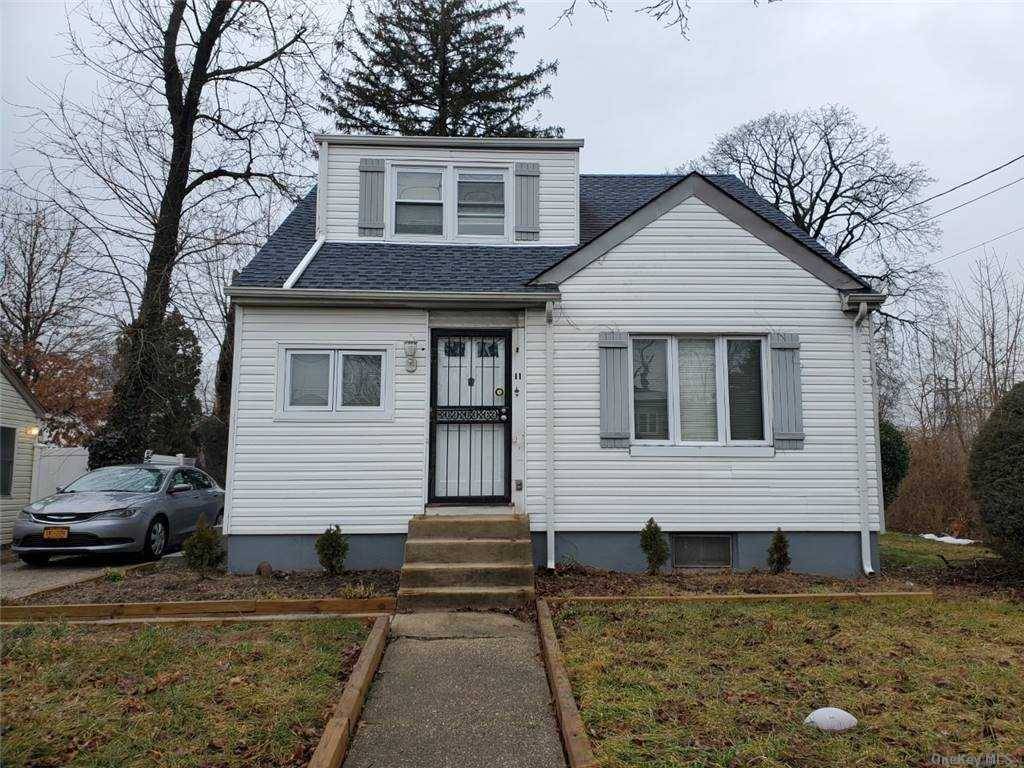 Lovely condition cape with one fully updated bathroom, freshly painted, new flooring, full finished basement.