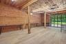 Barn studio space filled with light, glass garage door