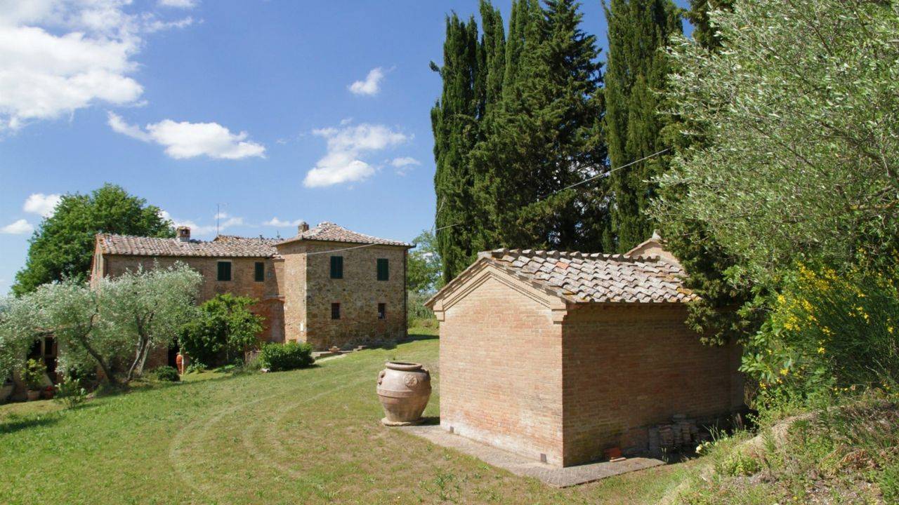Property for sale Tuscany. Siena crete senesi area country house for sale with chimney and original bricks.It is possible to built a swimming pool