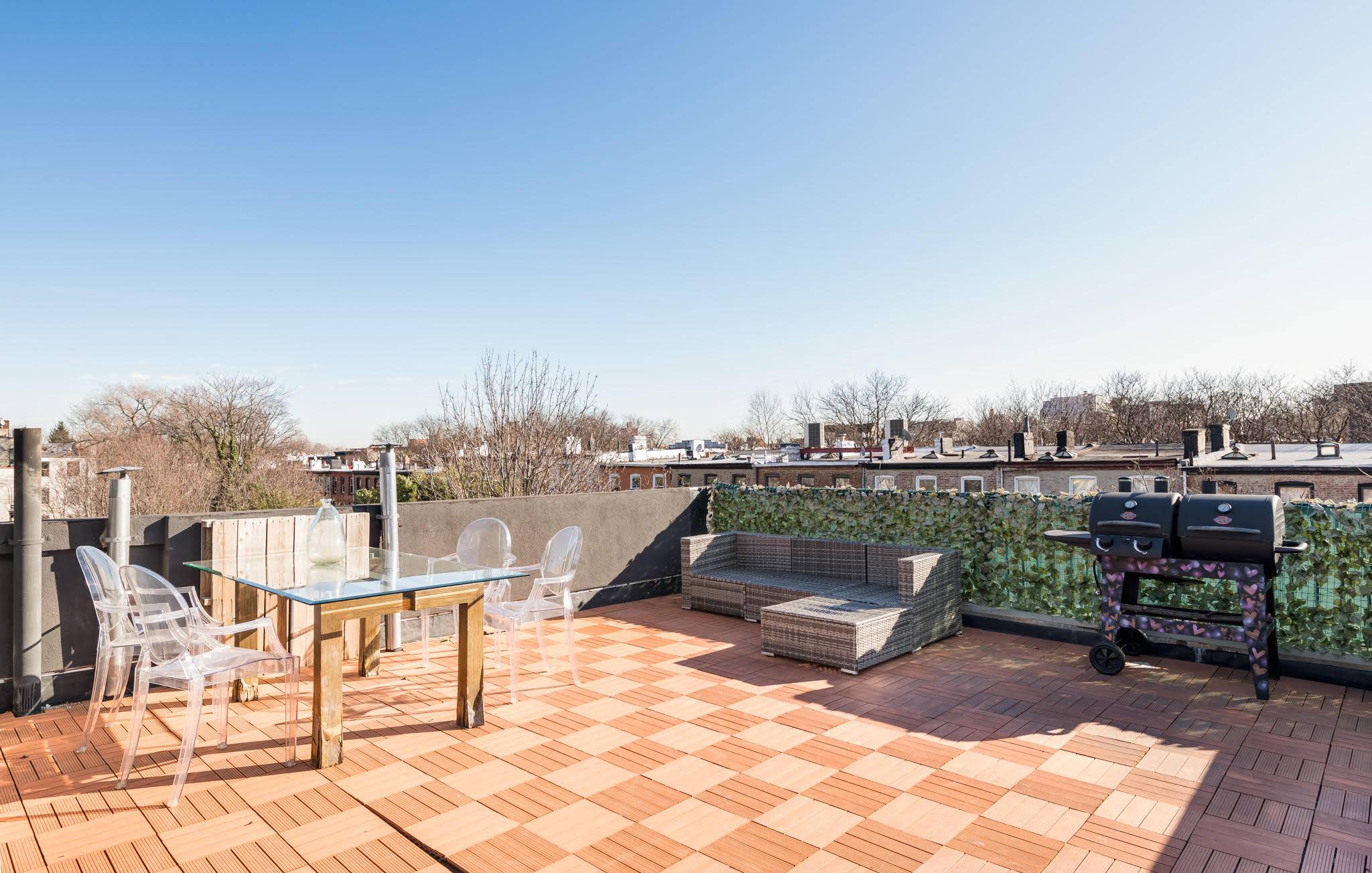 This very sunny true 2 bedroom, 2 bath penthouse apartment is a cut above the rest with renovated kitchen and baths and a private roof deck with city views.