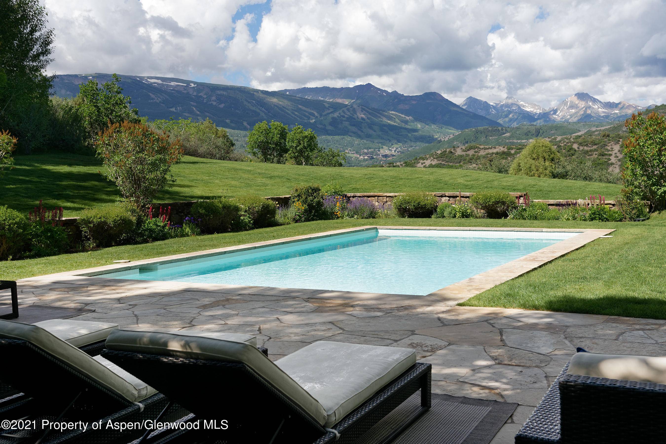 This exceptional 35 acre property has gorgeous views, a heated Pool, and comes with a TDR !