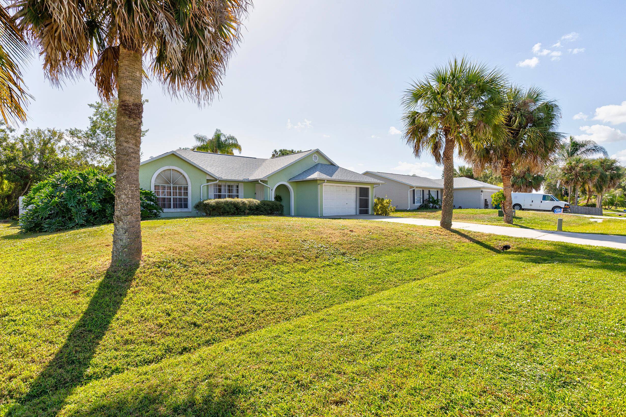 Charming 3 bedroom, 2 bathroom, Double door entrance, NO HOA with a formal dining room, and an oversized lot in the heart of Sebastian, Florida.