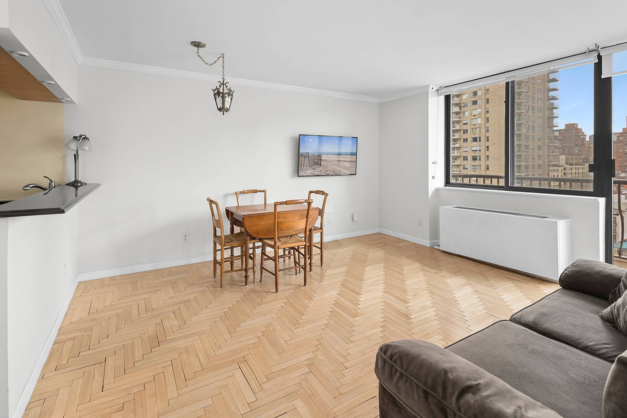 Investor Friendly Condop Priced to Sell A bright and efficient convertible 1 bedroom at The Forum in Lenox Hill.