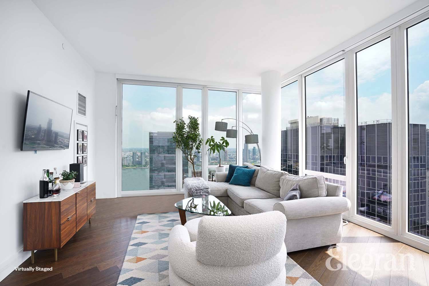 High floor luxury 2 bed 2 bath with floor to ceiling windows, w d in unit, and unparalleled amenities !