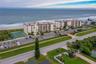 The amenities include a tennis court, ample guest and resident parking, and easy access to the main road—all within a secure and well-kept environment