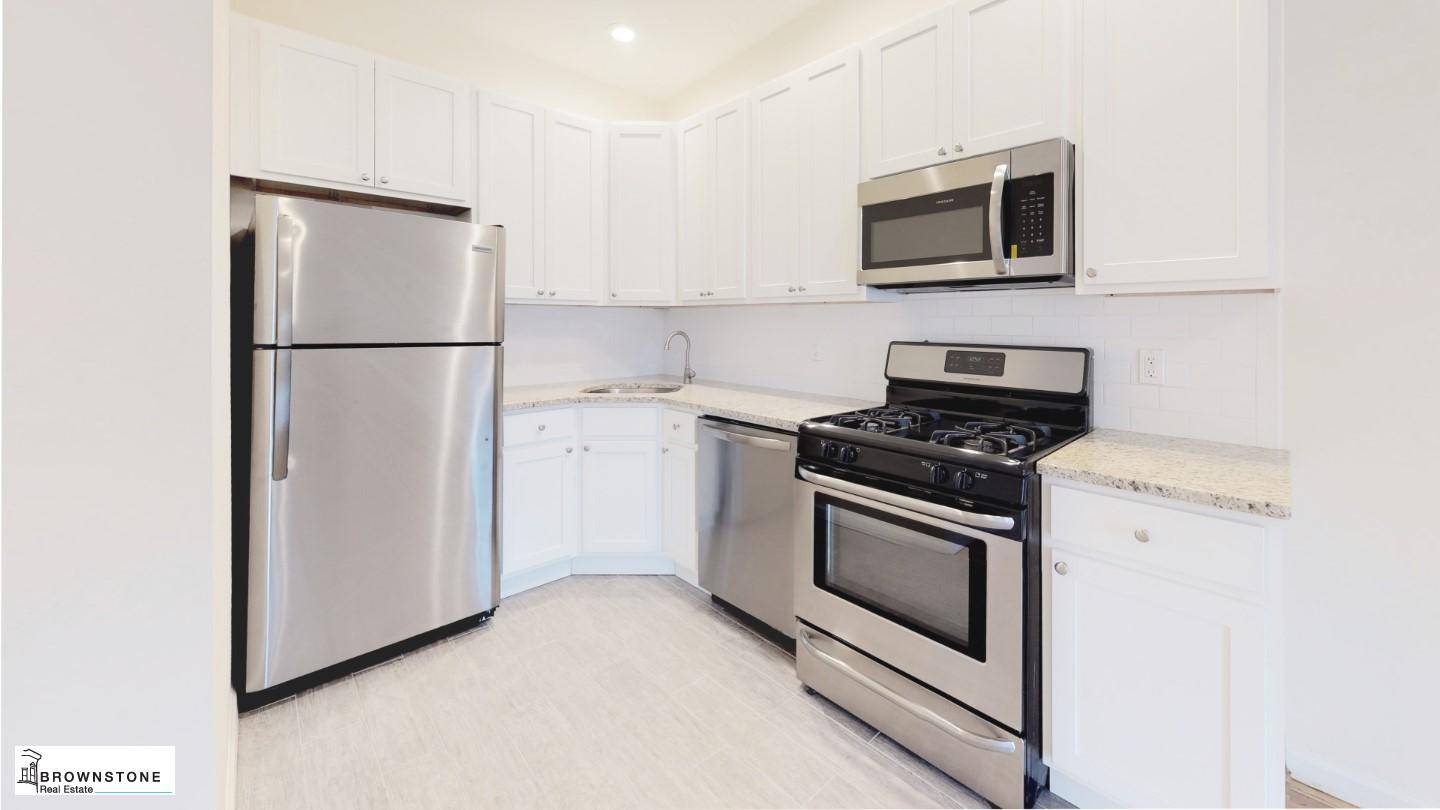 Between Henry and Hicks Streets, this newly renovated, two bedroom apartment is a refreshingly spacious and modern abode in an historic carriage house conversion.
