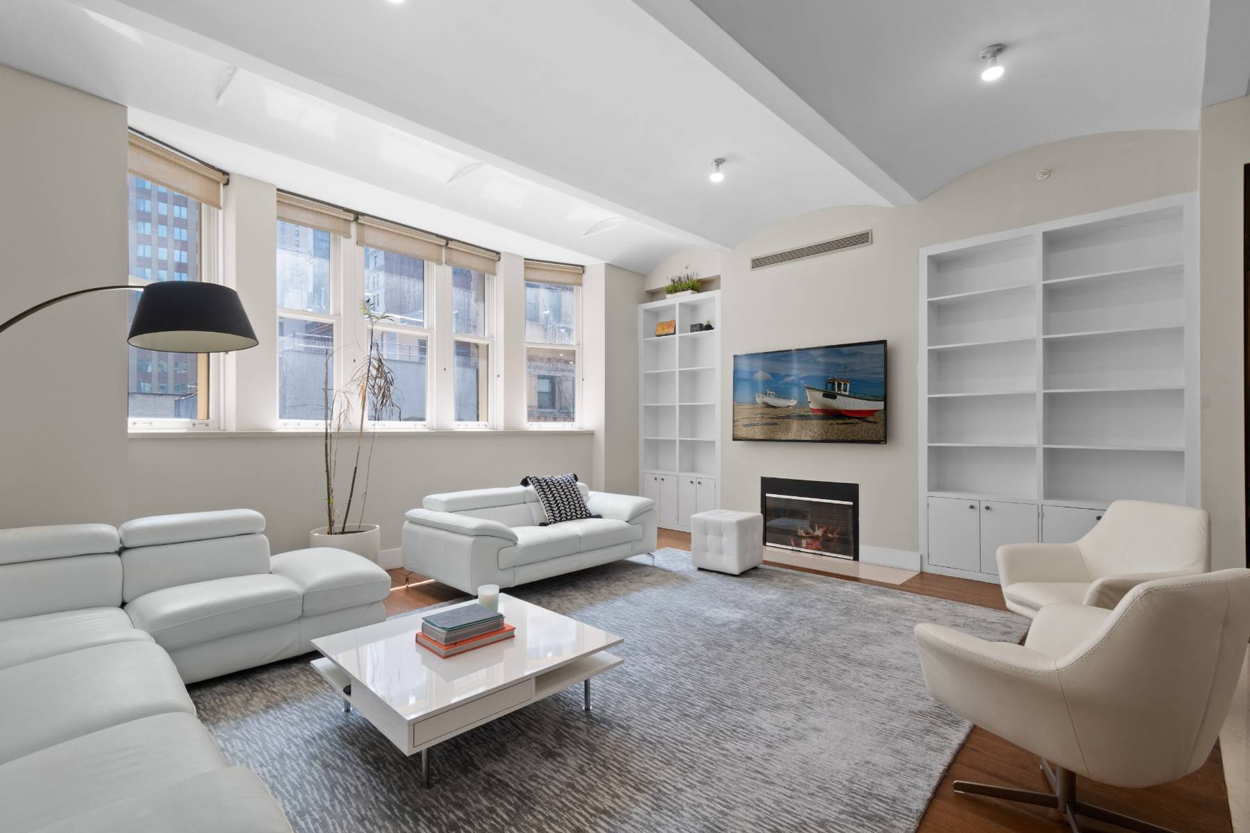 This expansive, flow through 2 bedroom, 3 bathroom loft home is nestled in the border of FiDi and Tribeca.