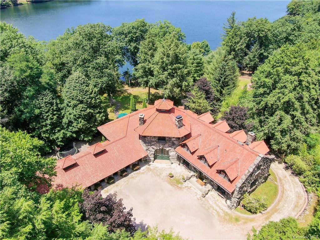 Lorillard Lake House constructed of monolithic stone for the founder of Tuxedo Park in 1893, is considered one of the finest examples of this style of architecture in America.
