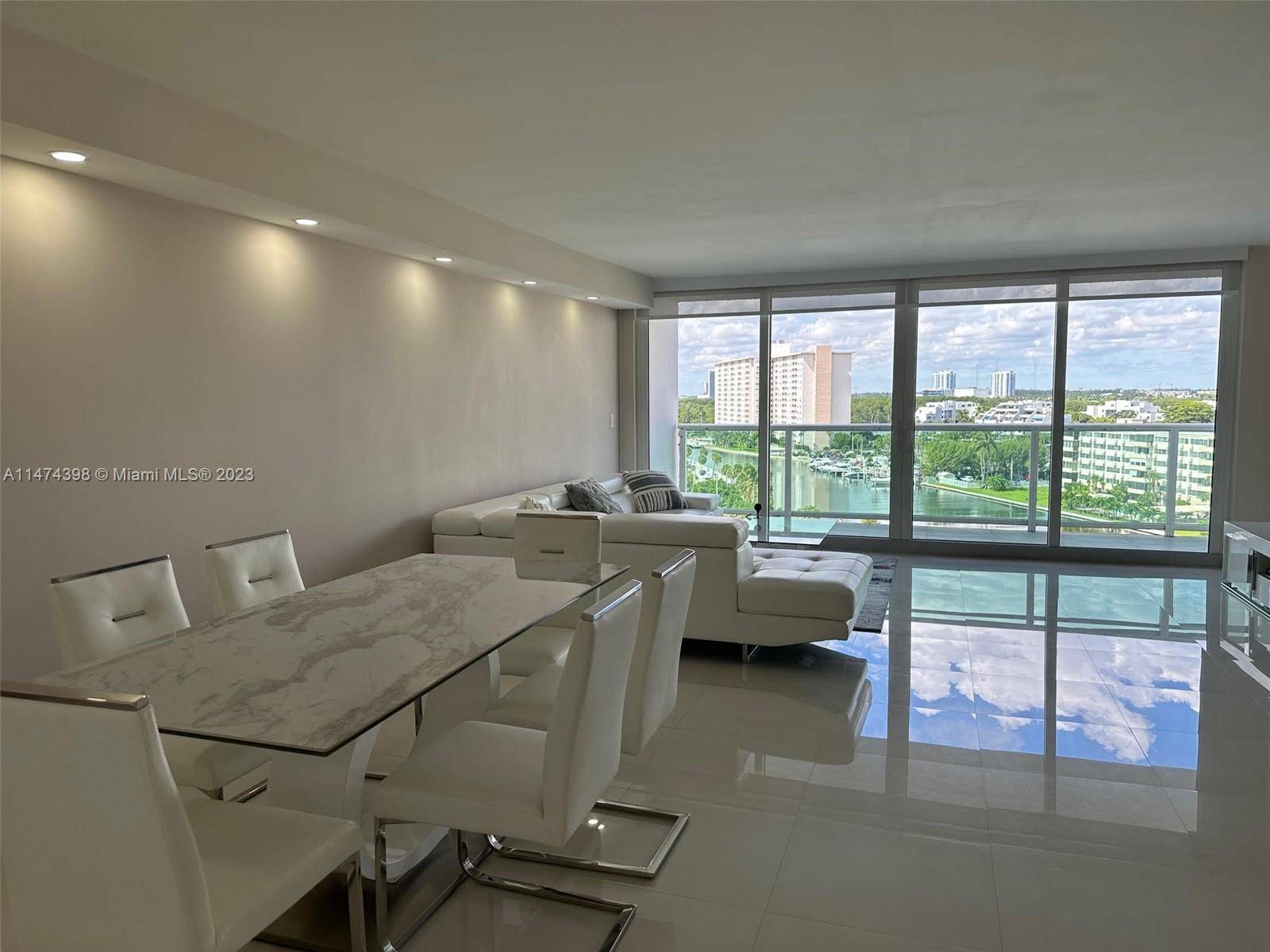 MODERN STYLE CONDO WITH WHITE PORCELAIN FLOORS ALL THROUGHOUT.