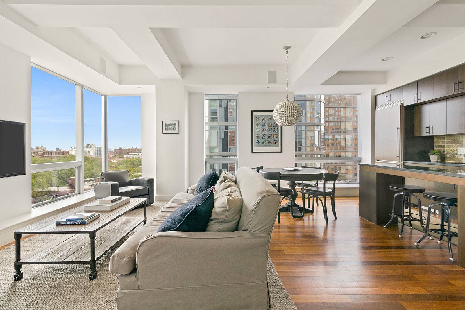 Bespoke and beautiful, residence 1001 at the Toren Condominium is a sprawling split two bedroom two bath with breathtaking Manhattan views from a wall of nearly uninterrupted floor to ceiling ...