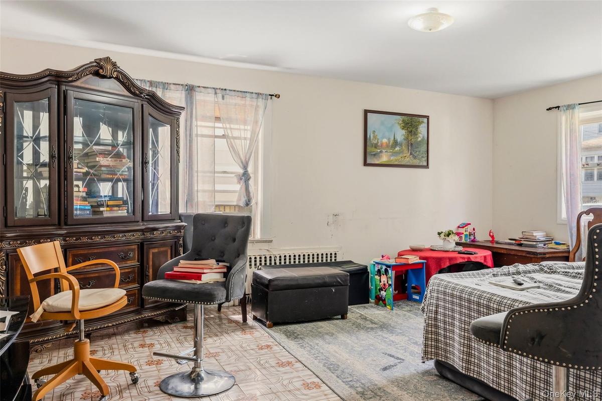 Spacious interior with neutral wall colors and multiple windows
