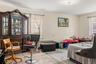 Spacious interior with neutral wall colors and multiple windows