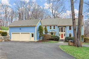 Sun drenched four bedroom Colonial with pool, stone terrace and hot tub graces 2.