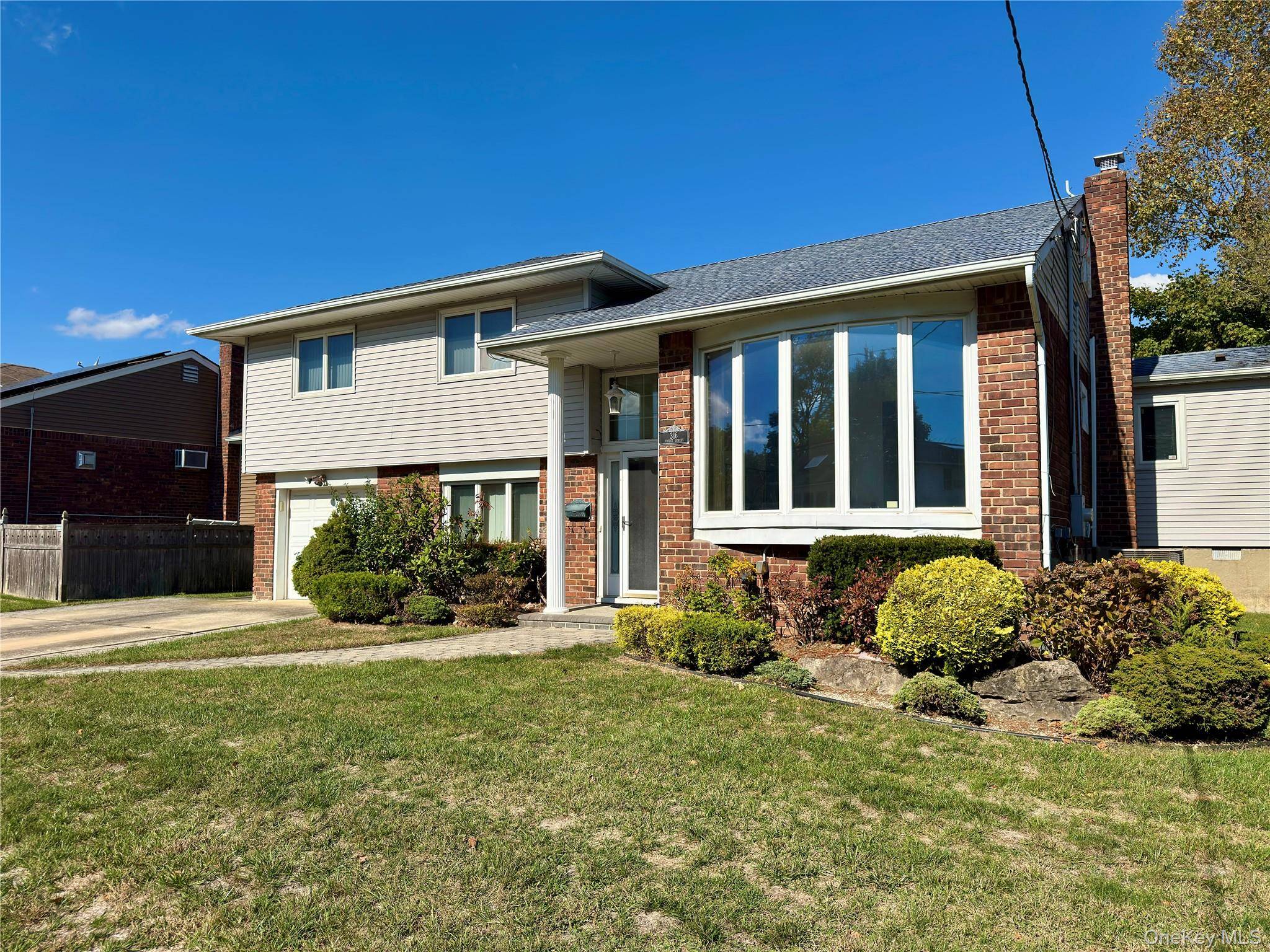 Welcome to this Beautiful expanded Split Level Home featuring 4 Bedrooms, 2.