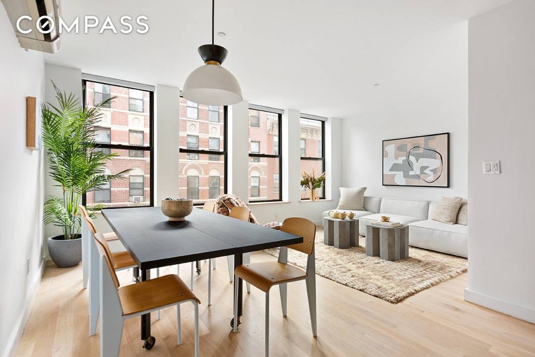 This floor through 1, 316 SF two bedroom, two bathroom prewar condominium circa 1900 in the heart of the Lower East Side is a rarely available, serene and light filled ...