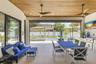 Oversized lanai area with cypress tongue and groove ceilings & retractable screens