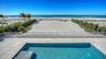 Picture yourself here, enjoying 100 feet of private beach