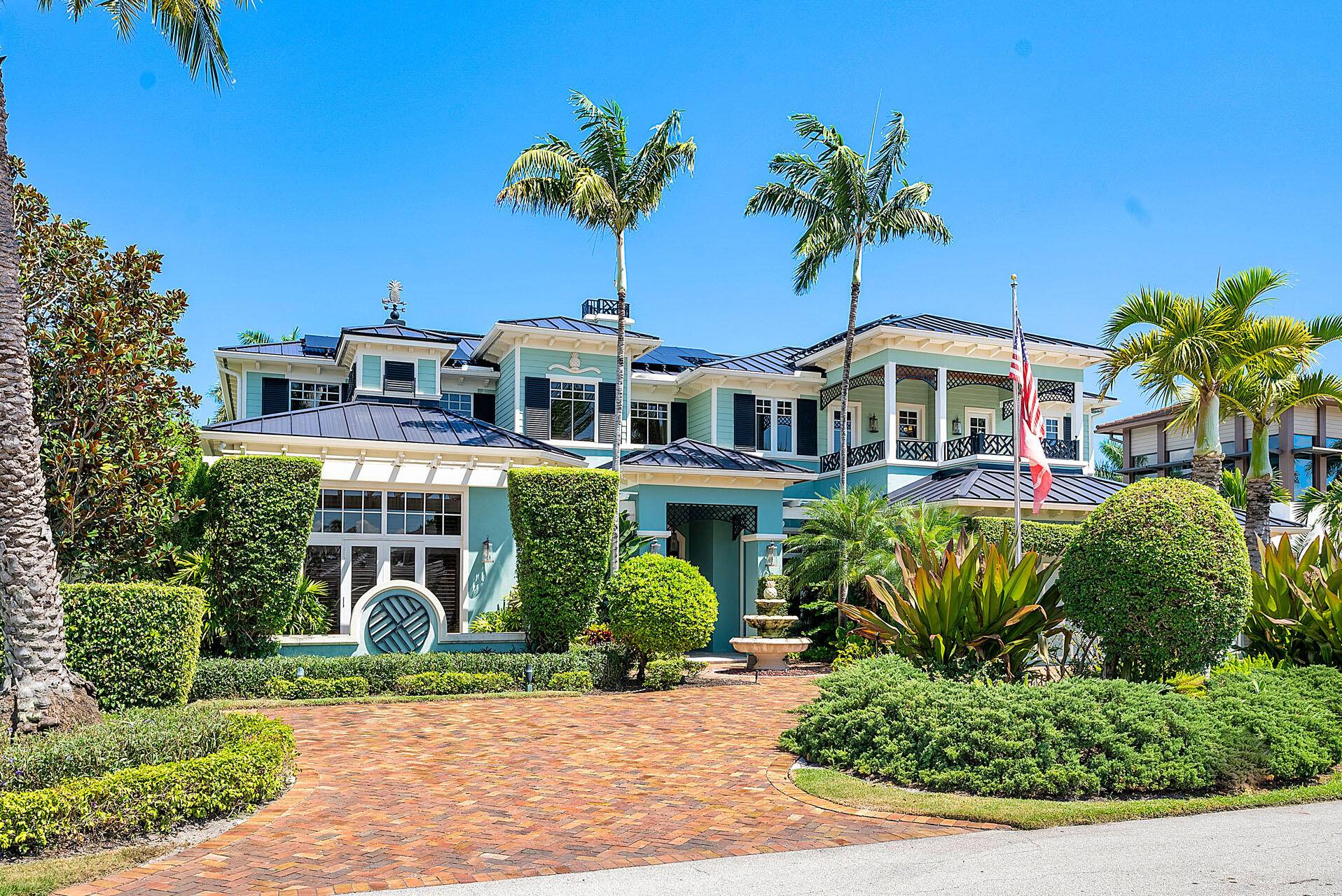 359 Thatch Palm Drive is a captivating West Indies style estate situated on an oversized interior lot in South Florida's most desirable community, Royal Palm Yacht Country Club.