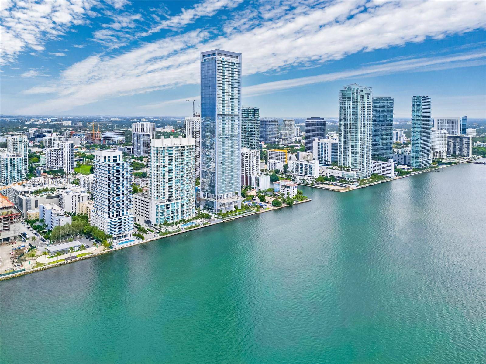 This extraordinary residence offers breathtaking views of Miami Skyline and Bayfront Views.