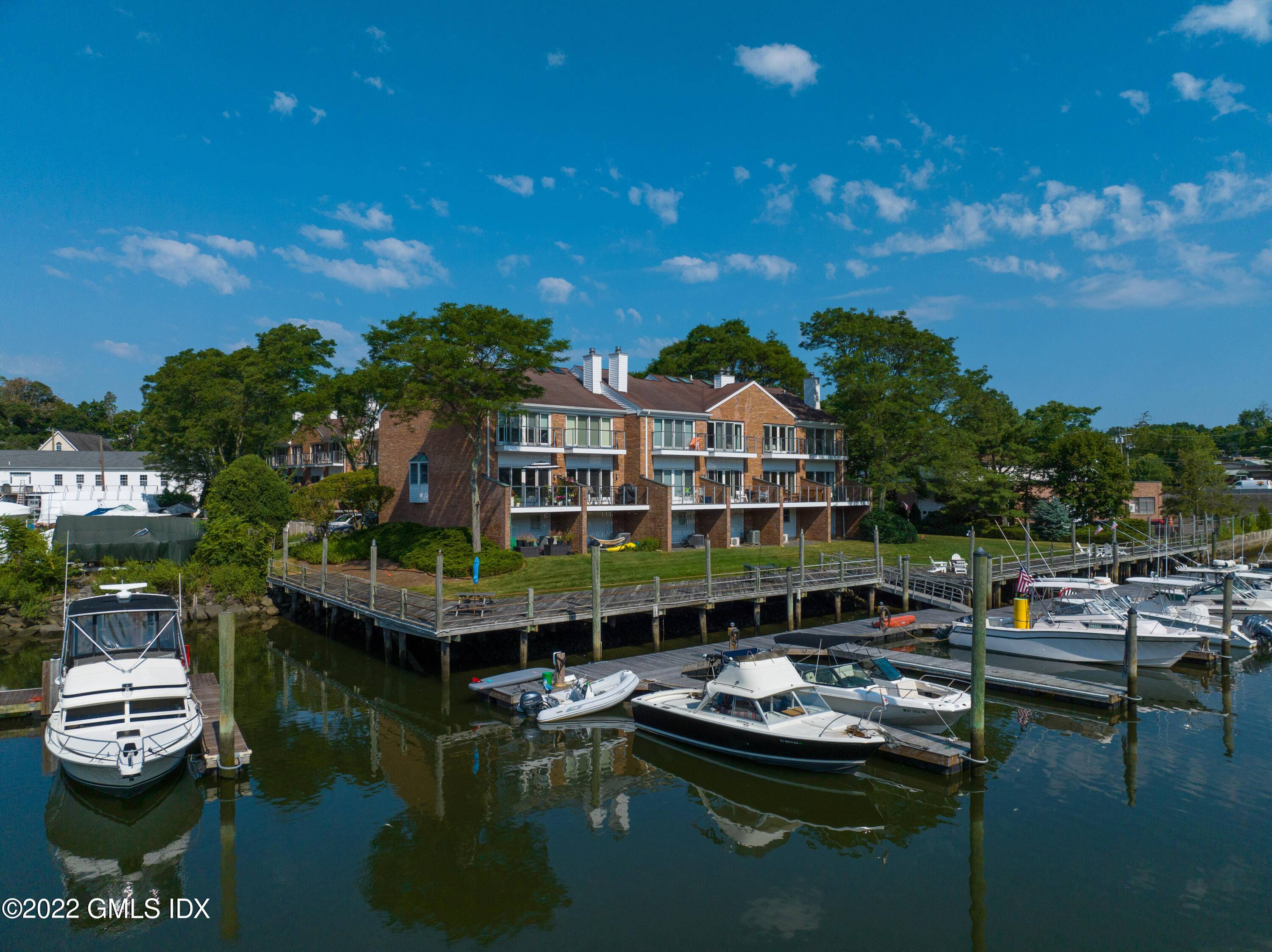 Impeccable waterfront condo with dedicated 36' deep water boat dock.