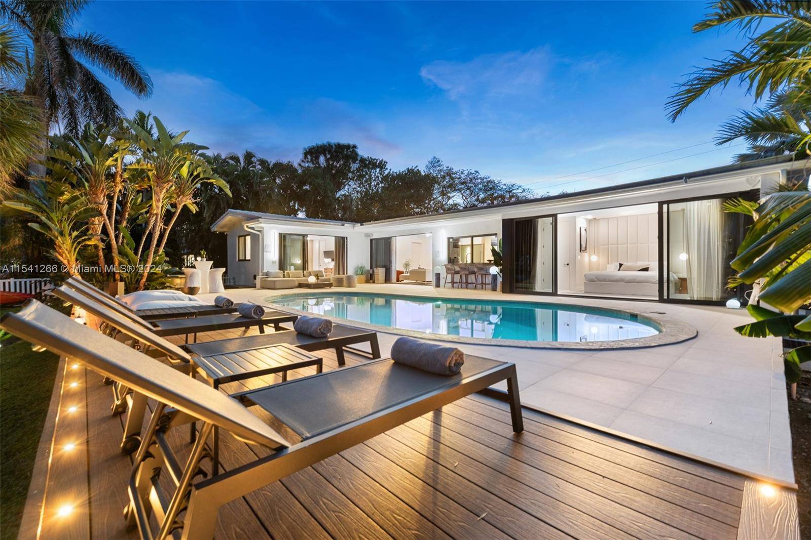 Step into this fully remodeled modern 5 bedroom, 4 bathroom residence nestled in the charming Golden Isles neighborhood of Hallandale Beach.