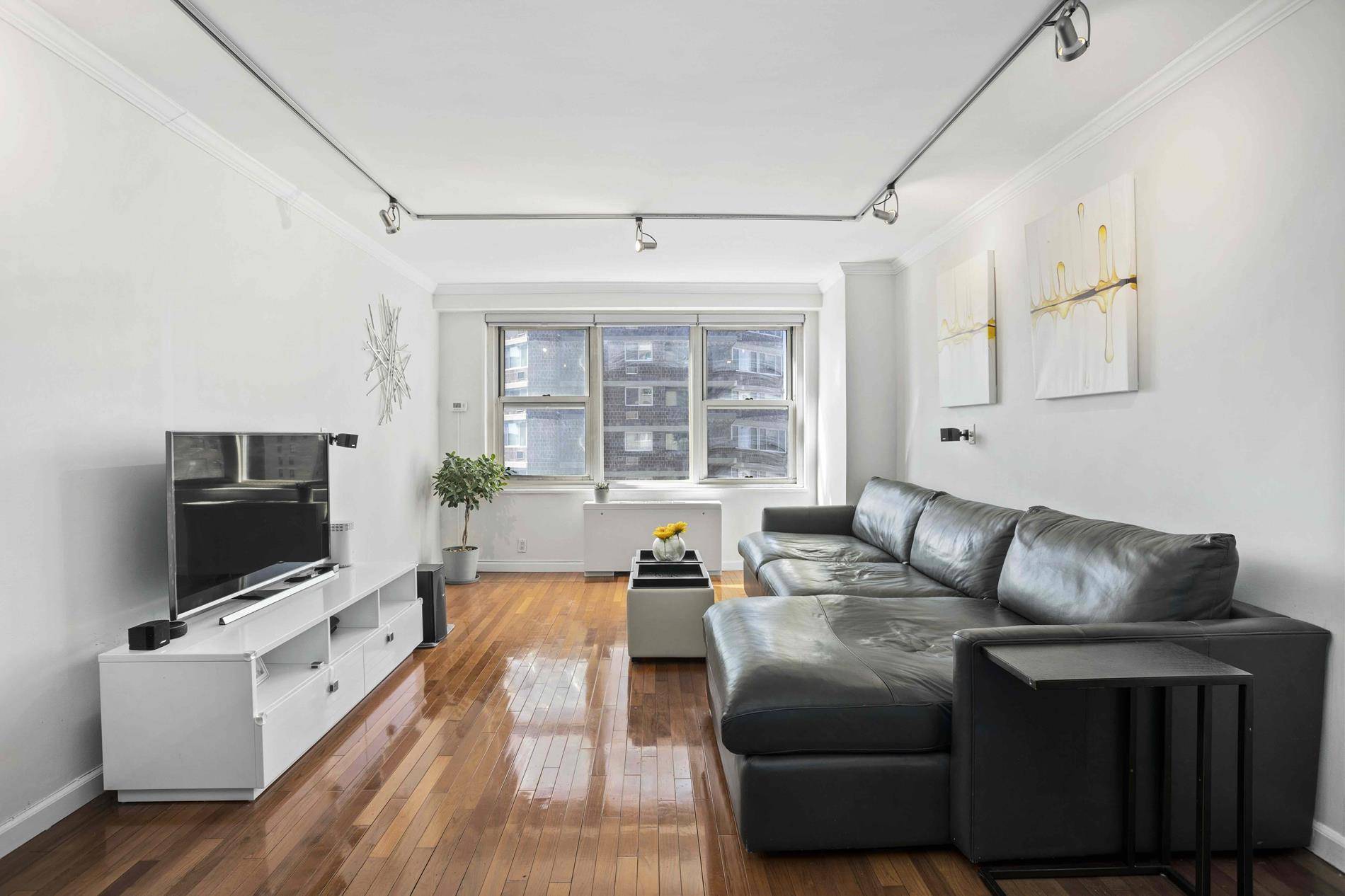MOVE IN READY ! This one of a kind, south facing extra large one bedroom offers an abundance of sunlight and views downtown including the Freedom Tower !