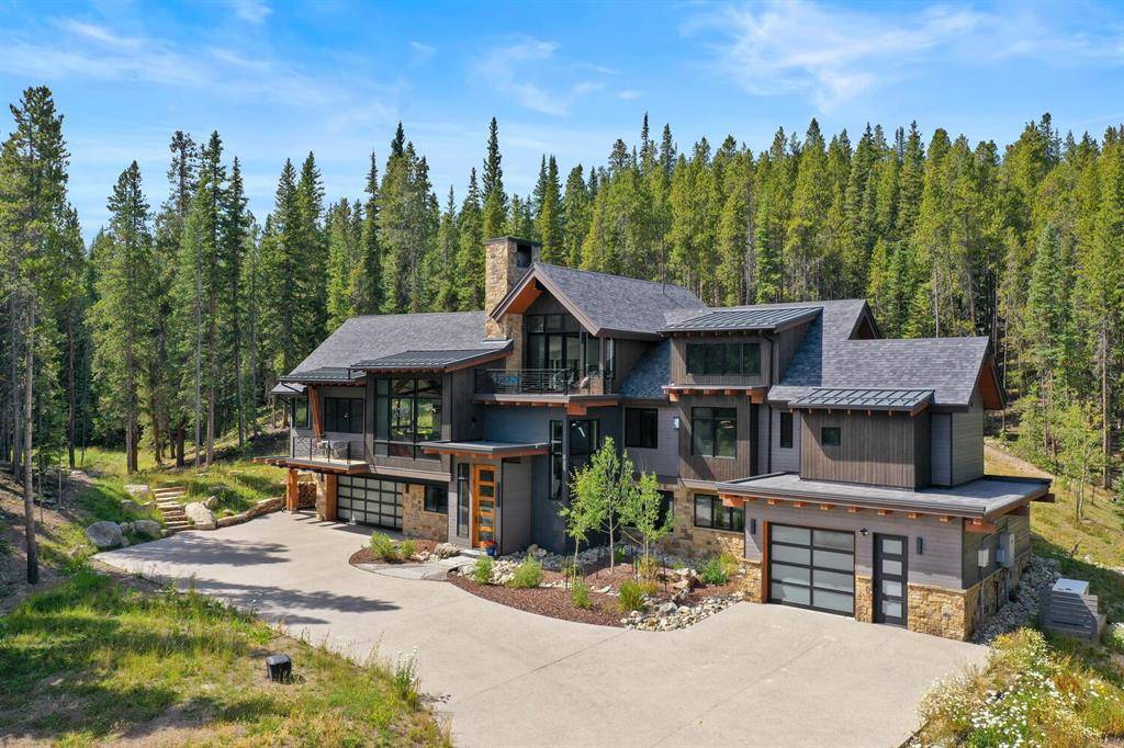 This one of a kind luxury mountain retreat rests on a tranquil lot with epic views of mountain Baldy.