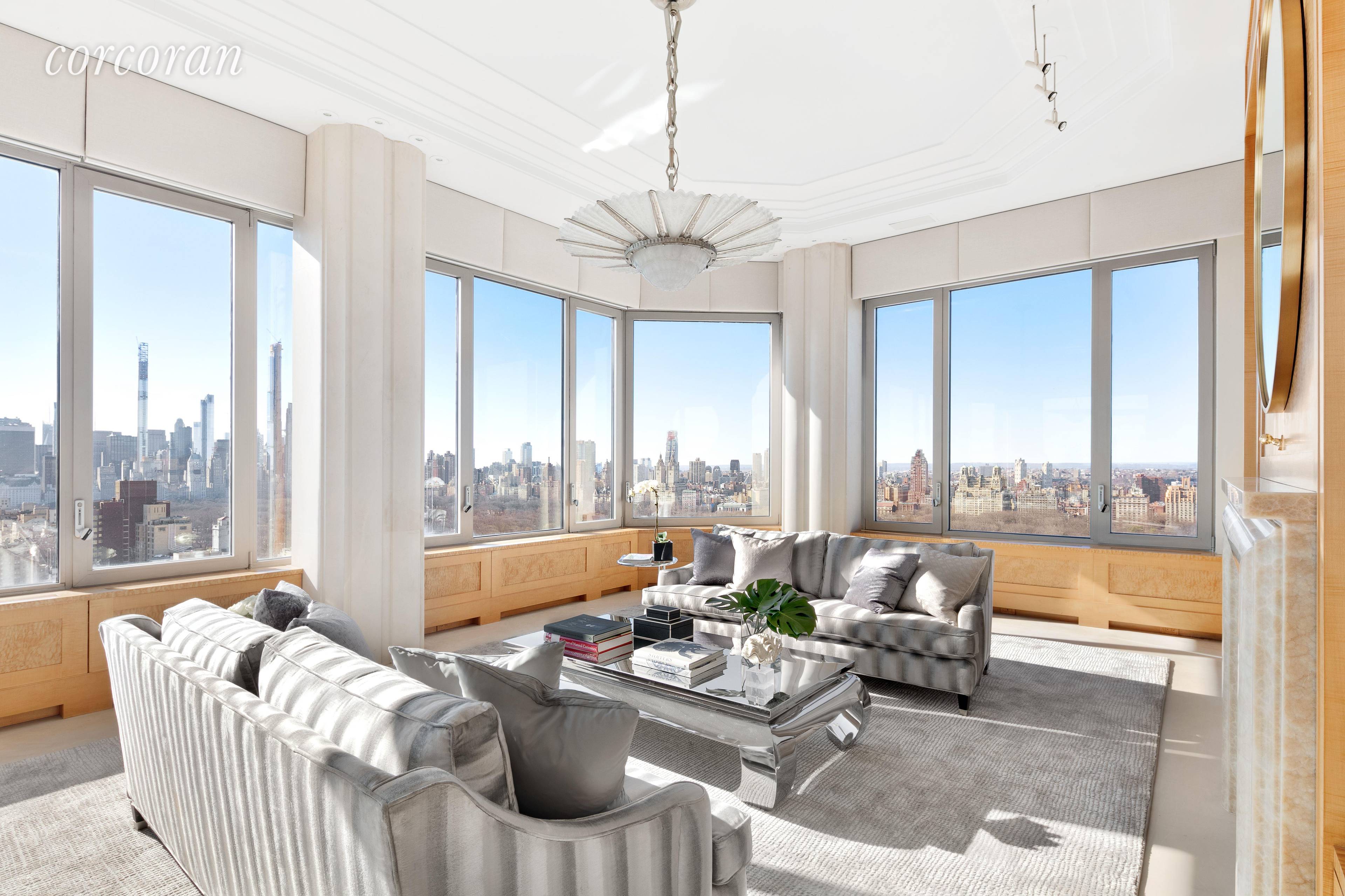 This triplex penthouse condominium residence with breathtaking views of Central Park, the reservoir, the East river, the West Side and southern city skyline views comprises 5, 180 sq.