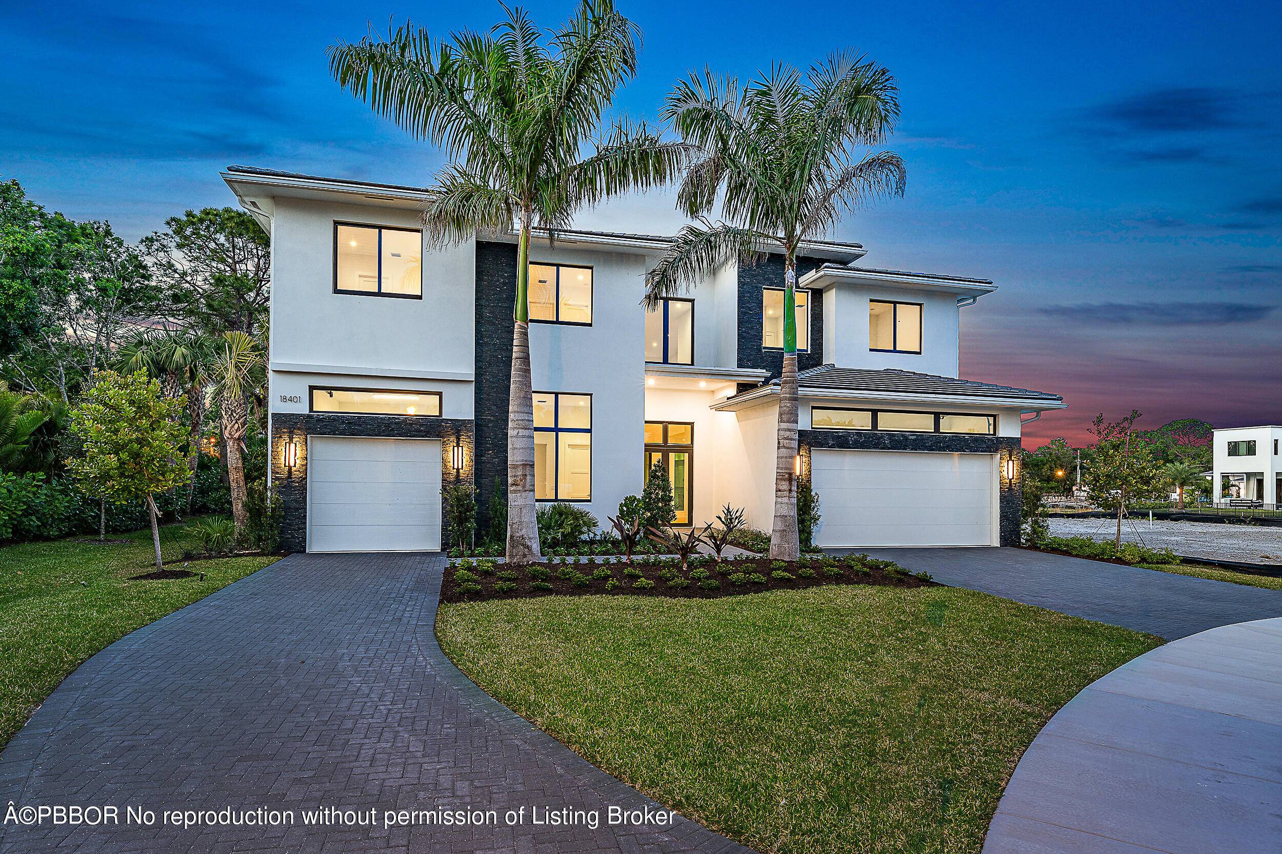 Located in Jupiter, FL's new ''Symphony'' community, this elegant home showcases the ''Tahoe'' design, featuring five bedrooms, five bathrooms, and a three car garage.