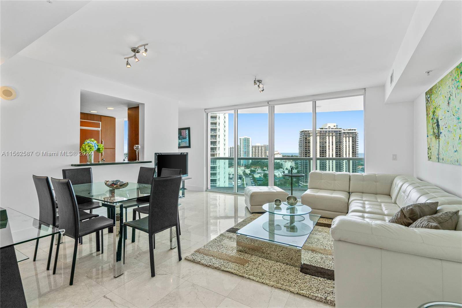 BEAUTIFUL FULLY FURNISHED 2 BEDROOMS PLUS DEN 3RD BEDROOM UNIT IN ONE OF THE BEST BUILDINGS IN AVENTURA.