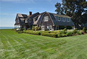 This beautiful Fenwick beachfront property enjoys stunning sunrises and sunsets with panoramic water views of Long Island Sound.