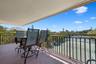 Covered lanai over looking tennis courts