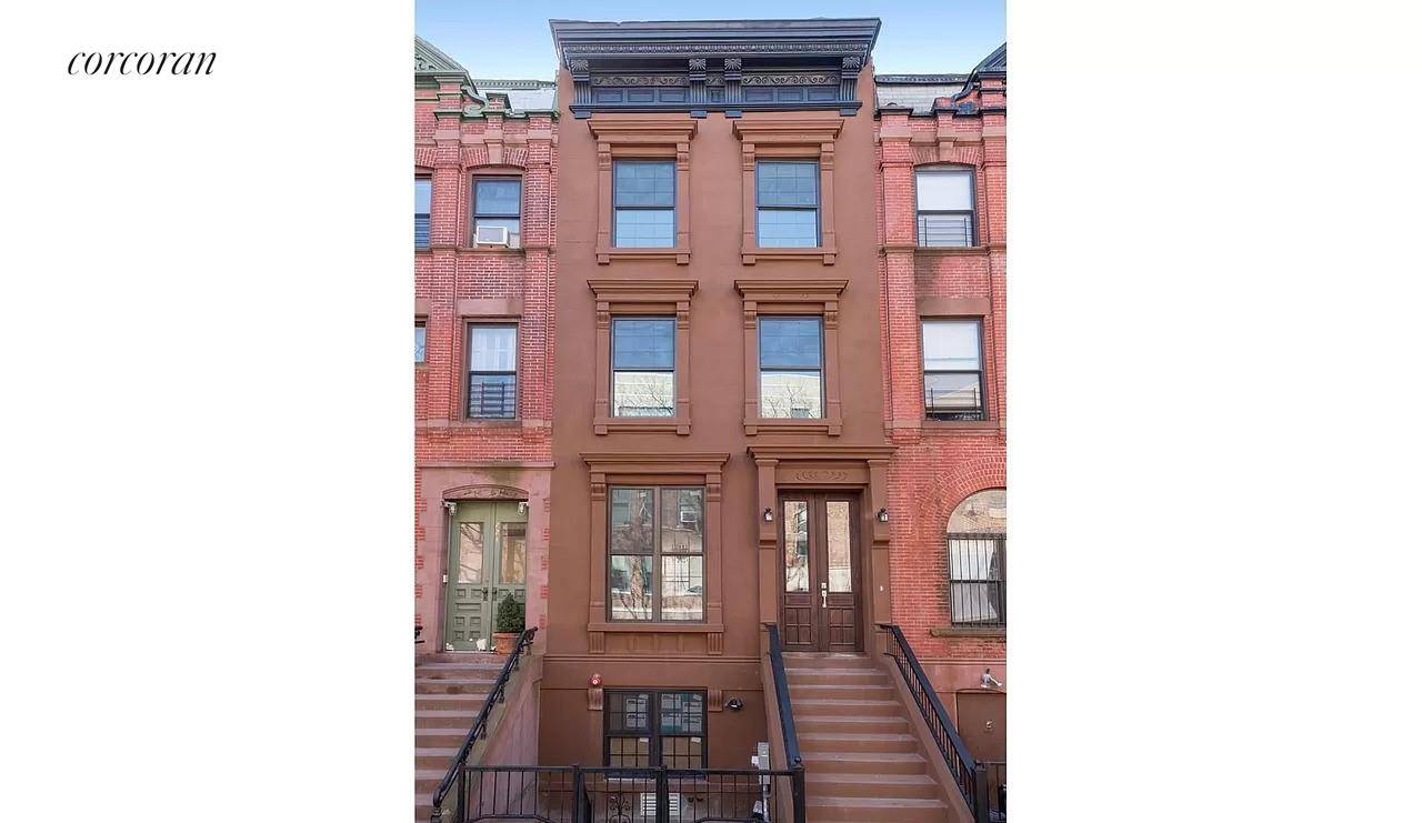 This classic brownstone has 4 bedrooms, 4.