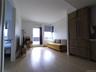 Living area with light wood-style flooring