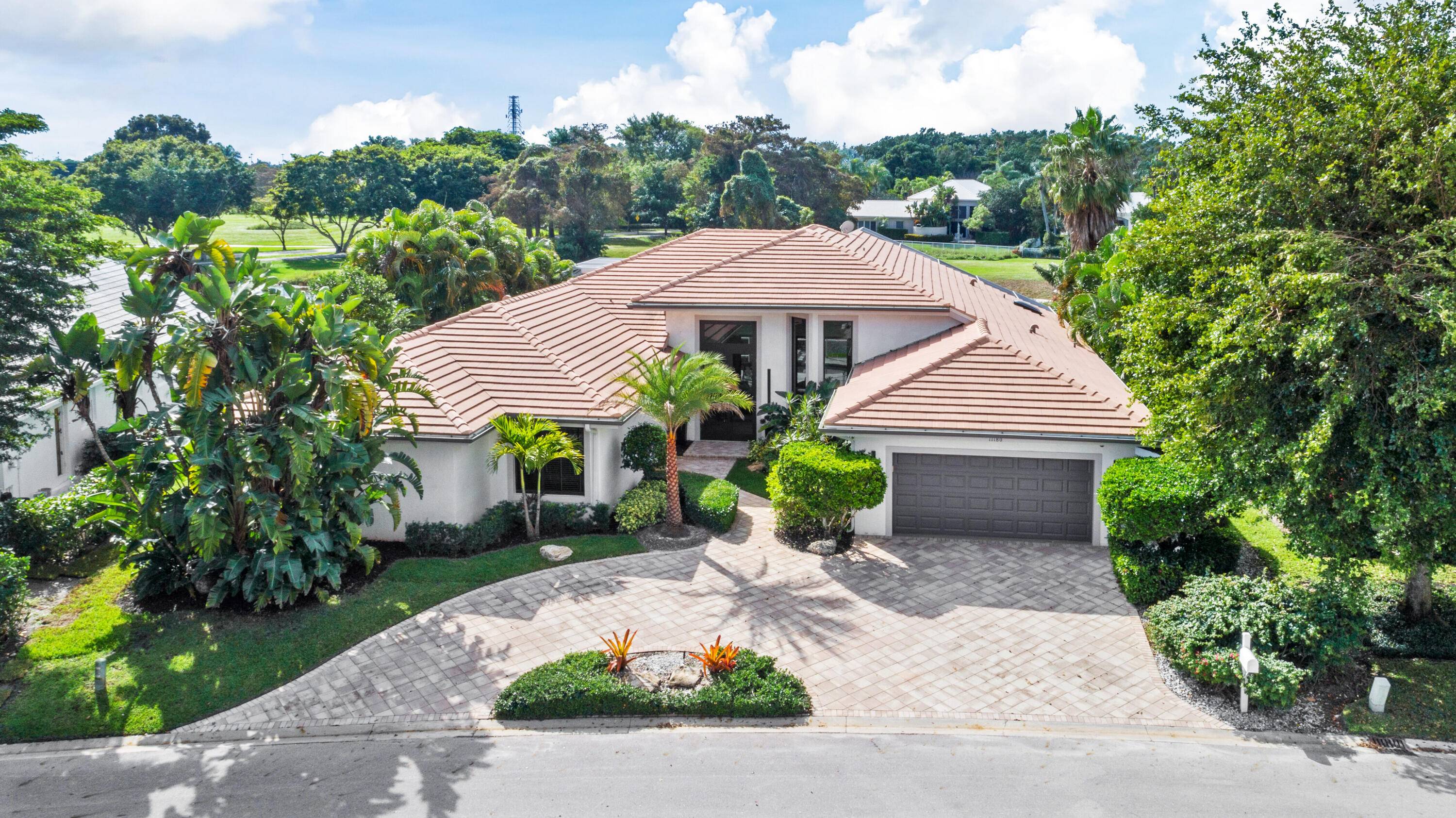 This magnificent home is located in the highly desirable neighborhood of Palm Beach Polo.