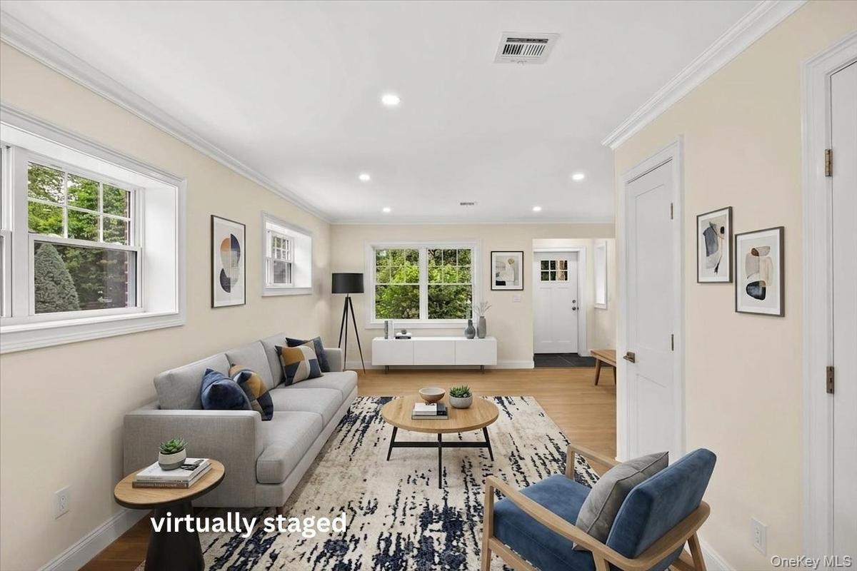 virtually staged area in front of the kitchen -sitting area conceptualized