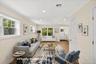 virtually staged area in front of the kitchen -sitting area conceptualized
