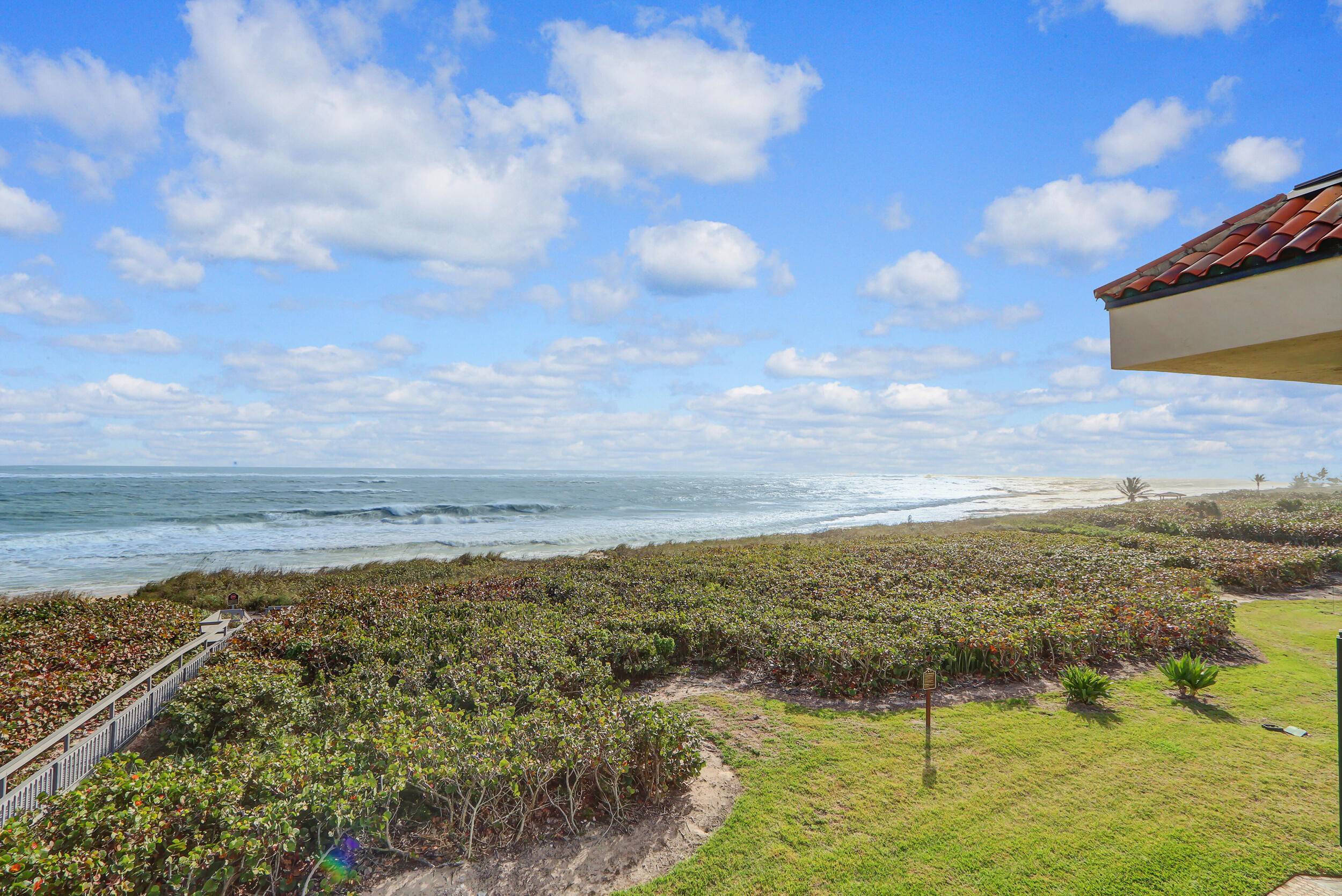 Experience coastal luxury in this breathtaking oceanfront condo unit, where panoramic views of the Ocean welcome you upon entry and granting direct access to pristine sandy beaches.