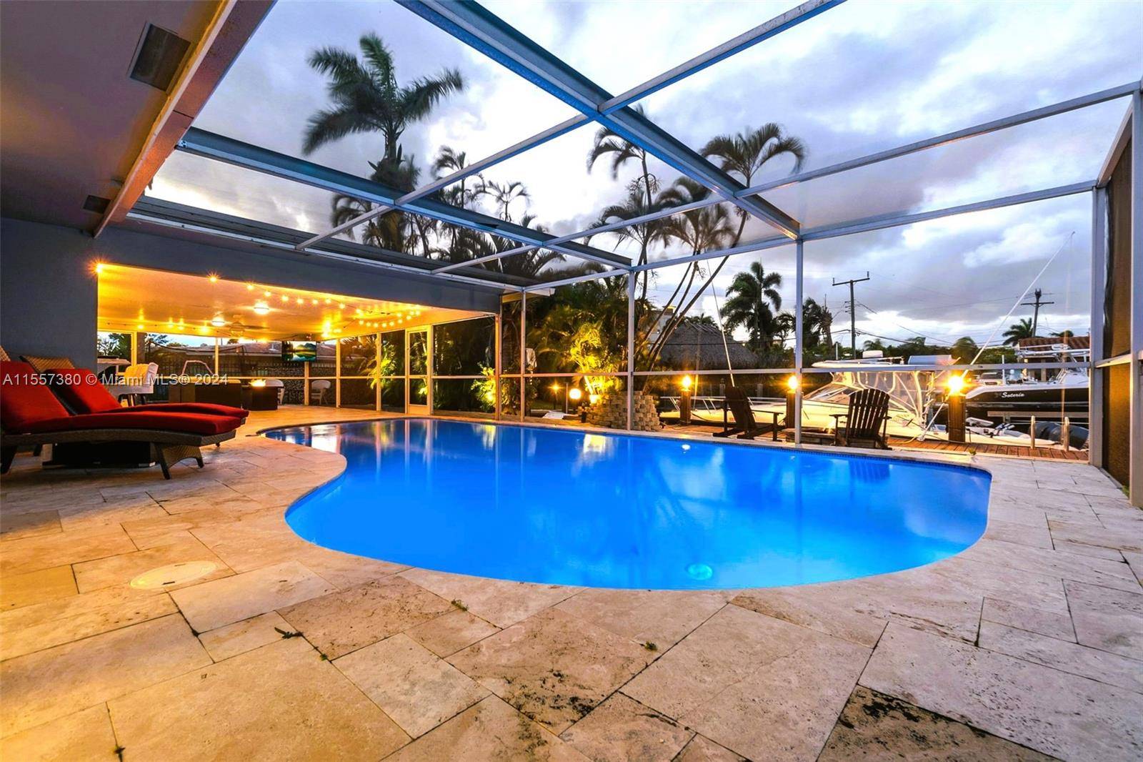 South Florida living at its finest with this stunning 3 bed 3 bath pool homel with 75' dock and direct ocean access no fixed bridges.