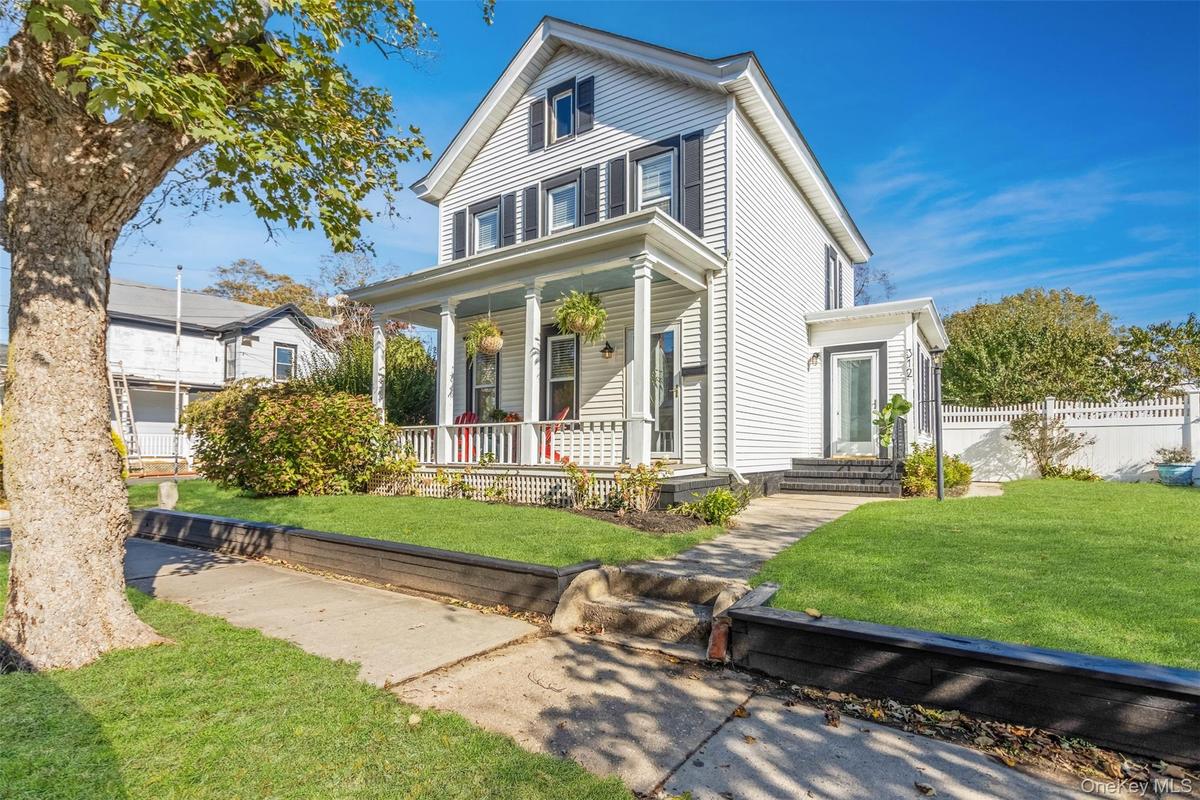 View of front of property with covered porch