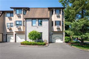 Your search ends here ! Located on a quiet cul de sac right on the Stamford Darien border, this bright and airy end unit townhome has it all !