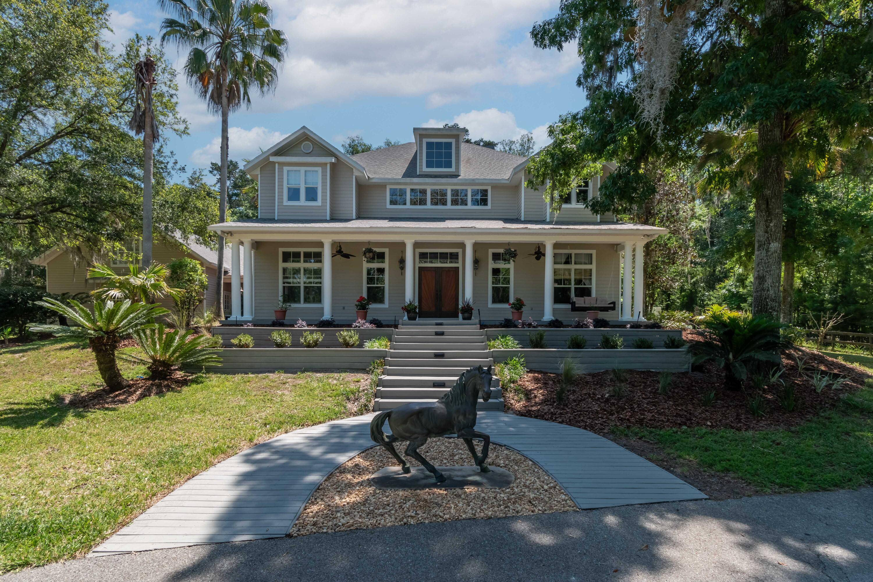 Step into this magnificent 50 acre gated equestrian estate, offering a custom built pool home, a 10 stall barn with air conditioned tack room and storage area, as well as ...