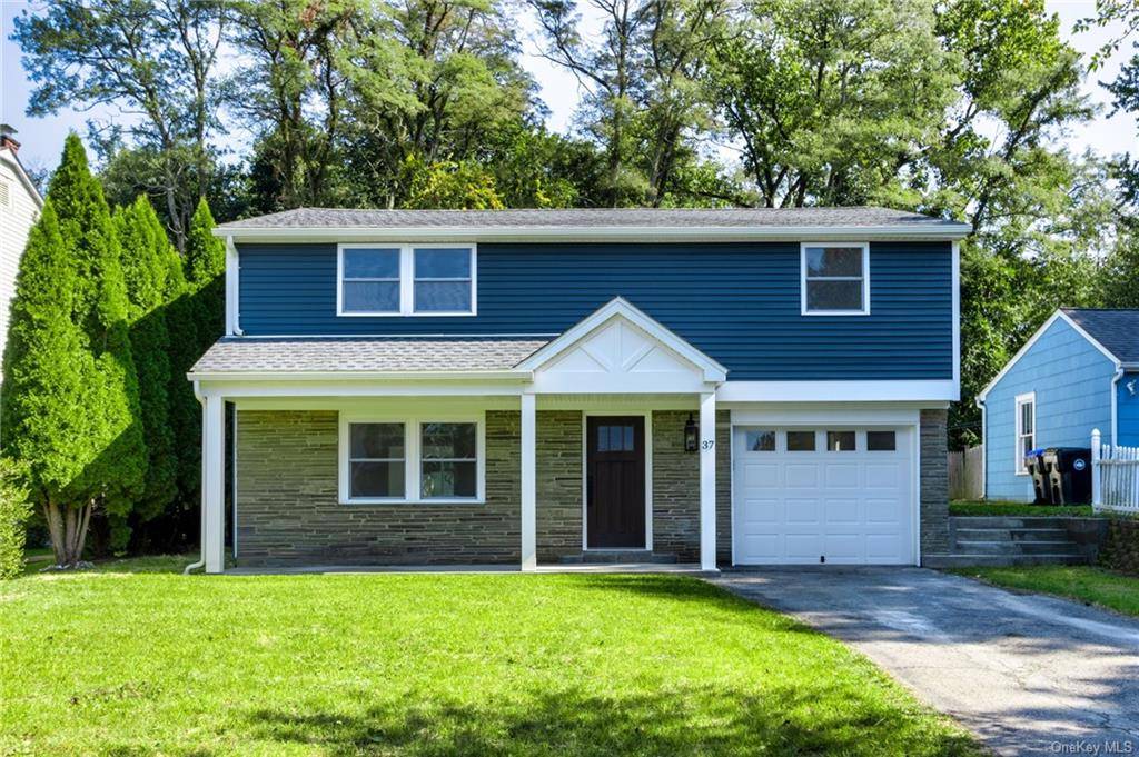 Located on a quiet tree lined street in the sought after South side of Poughkeepsie, this spacious 4 bedroom, 2.