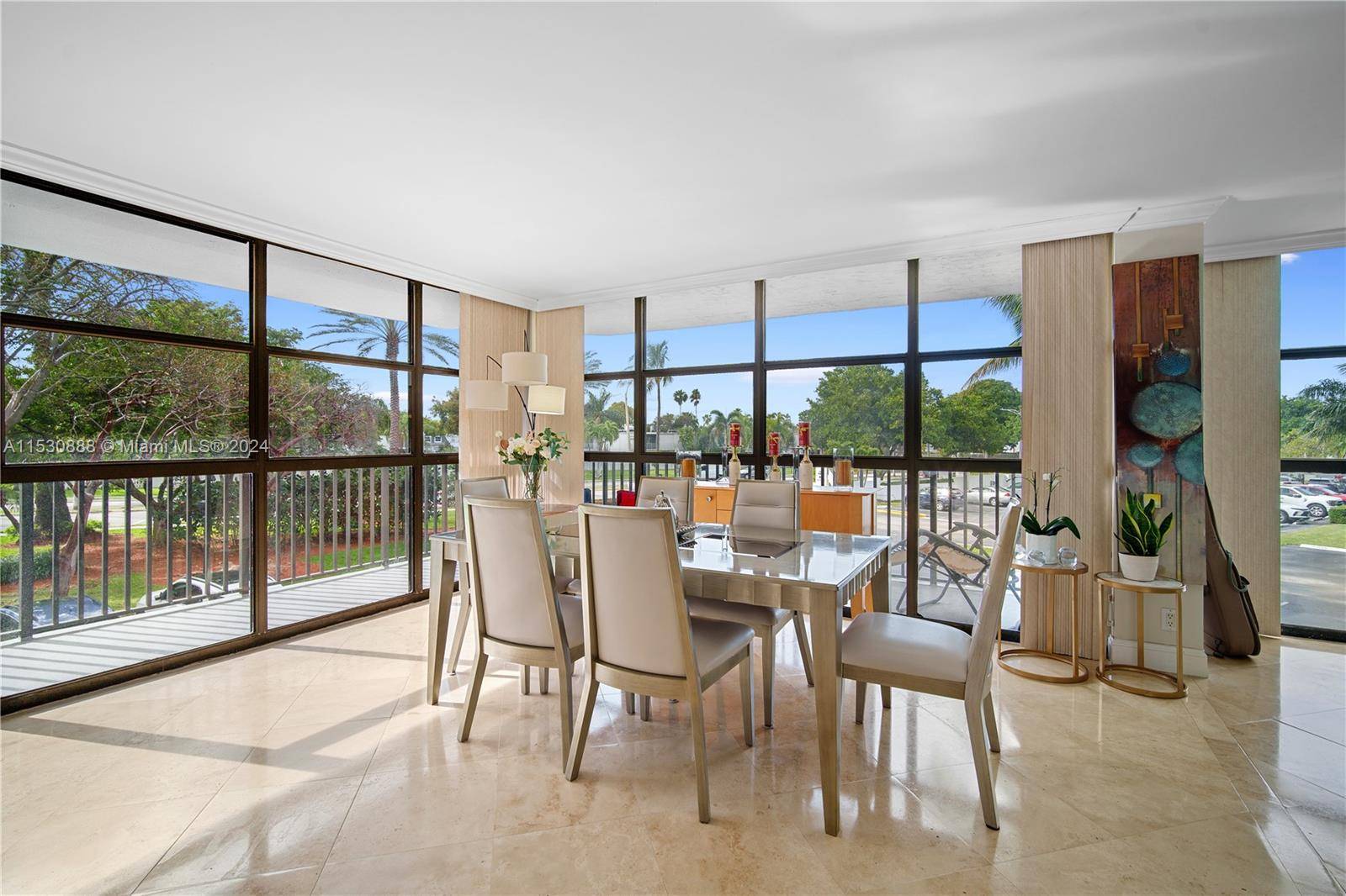 This flawless 2 2 corner unit has been completely renovated, featuring floor to ceiling windows, a wrap around balcony, and captivating tropical garden views.